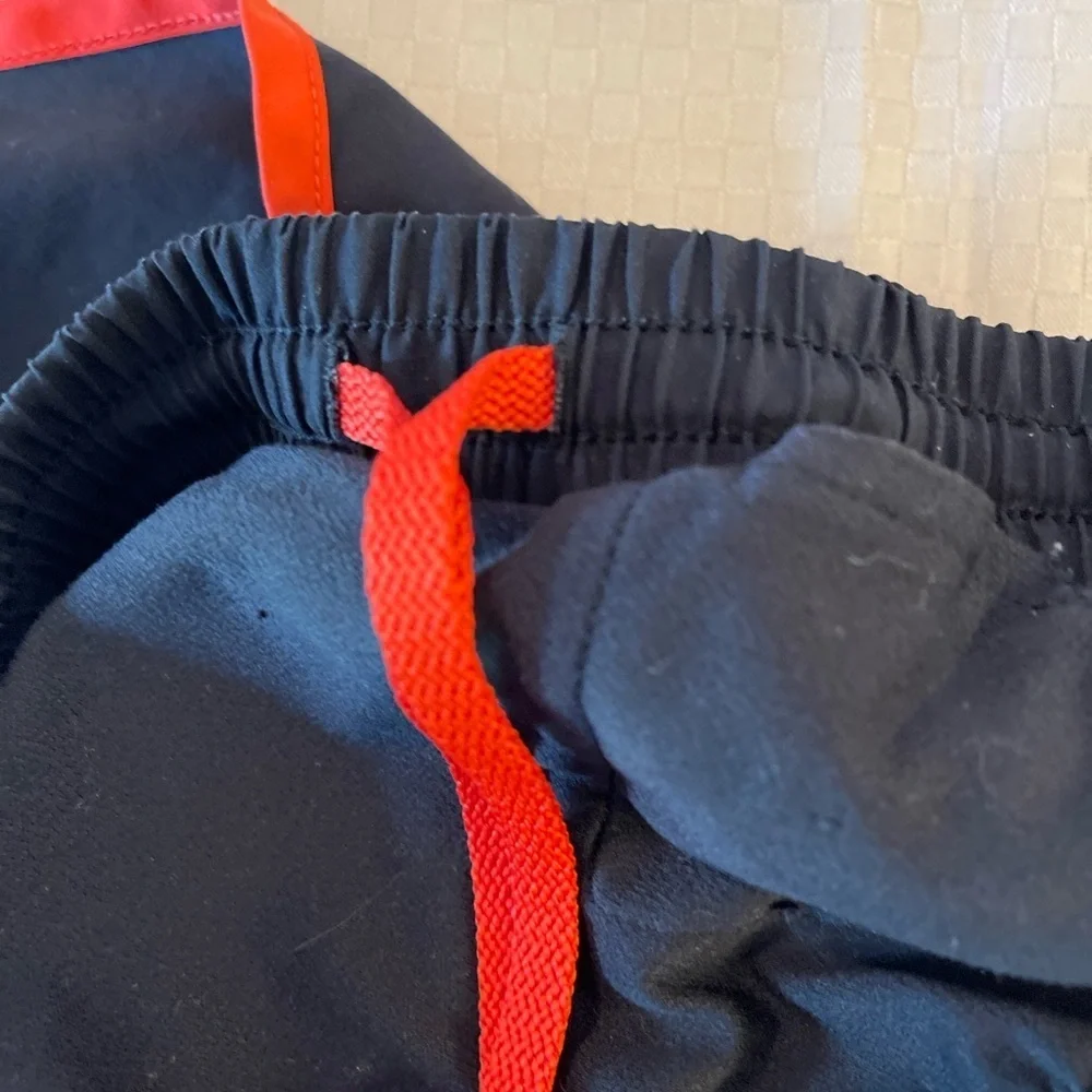 Under Armor black w/orange trip lined 3” inseam women’s running shorts. Size S. - Picture 4 of 7